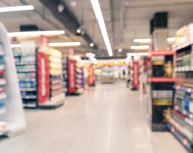 blurred supermarket aisle